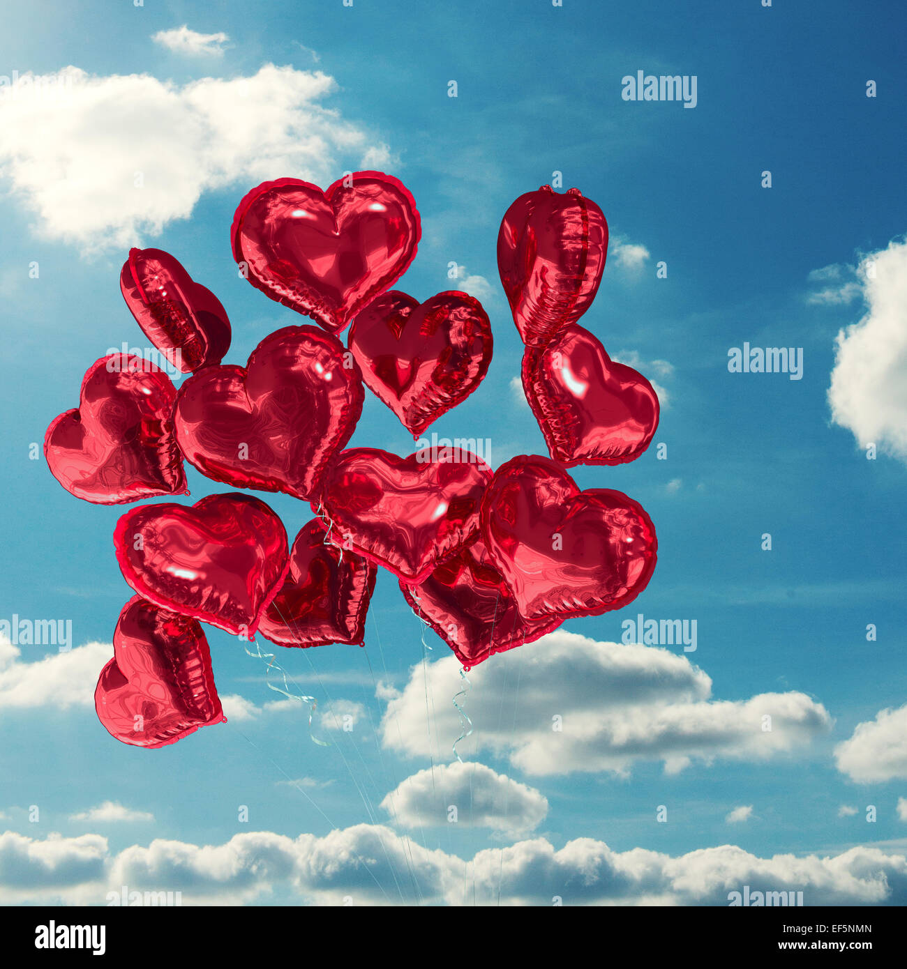 Composite image of heart balloons Stock Photo - Alamy