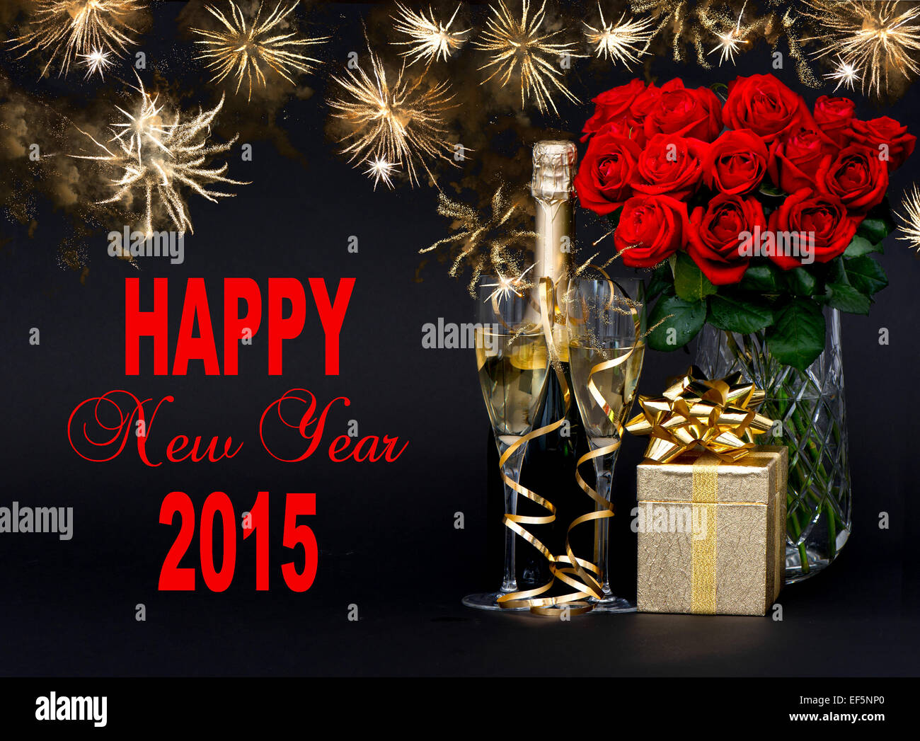 Happy New Year 2015! card concept. red roses, bottle of champagne, golden gift with beautiful golden fireworks on black backgrou Stock Photo
