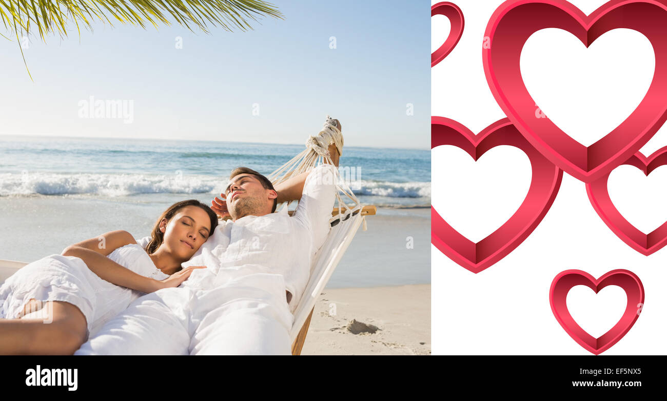 Composite image of calm couple napping in a hammock Stock Photo