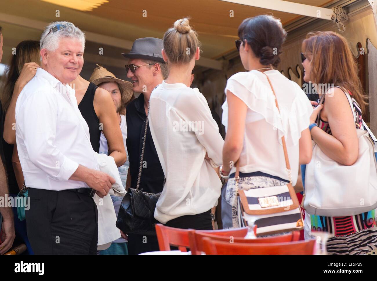 2014 World Cup winner Bastian Schweinsteiger and his girlfriend, Sarah Brandner are shown around the city of Dubrovnik, along with former Croatian defender Robert Kovac and his wife Anica, by Mayor Andro Vlahusic.  Featuring: Andro Vlahusic Where: Dubrovnik, Croatia When: 25 Jul 2014 Stock Photo
