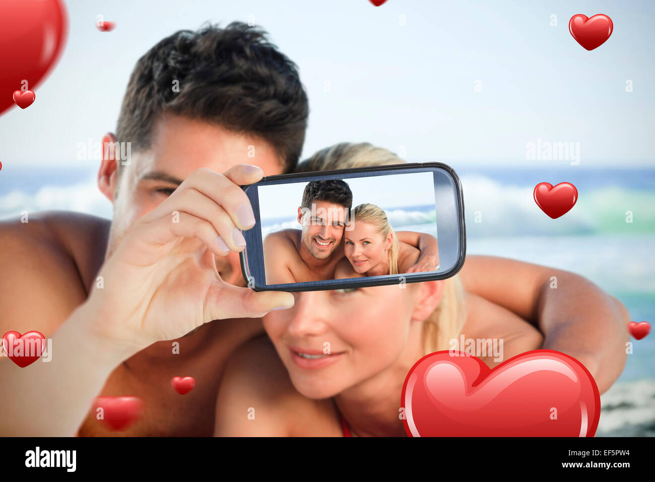 Composite image of valentines couple Stock Photo