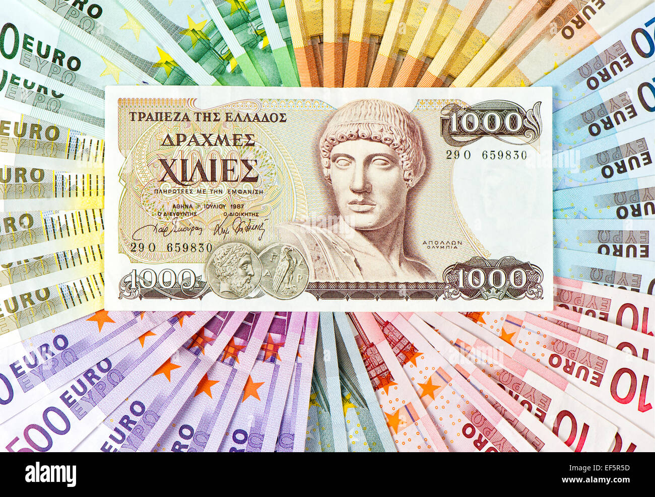 euro crisis concept. old greek drachma and euro cash notes Stock Photo