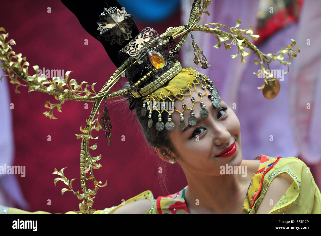 Singapore. 27th Jan, 2015. A performer dances on stage in Singapore's Suntec City on Jan. 27, 2015. The 22nd edition of 'Spring In The City' opens on Tuesday in Singapore's Suntec City as part of the Lunar New Year celebrations. © Then Chih Wey/Xinhua/Alamy Live News Stock Photo