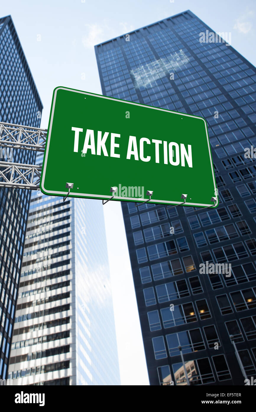 Take action against low angle view of skyscrapers Stock Photo