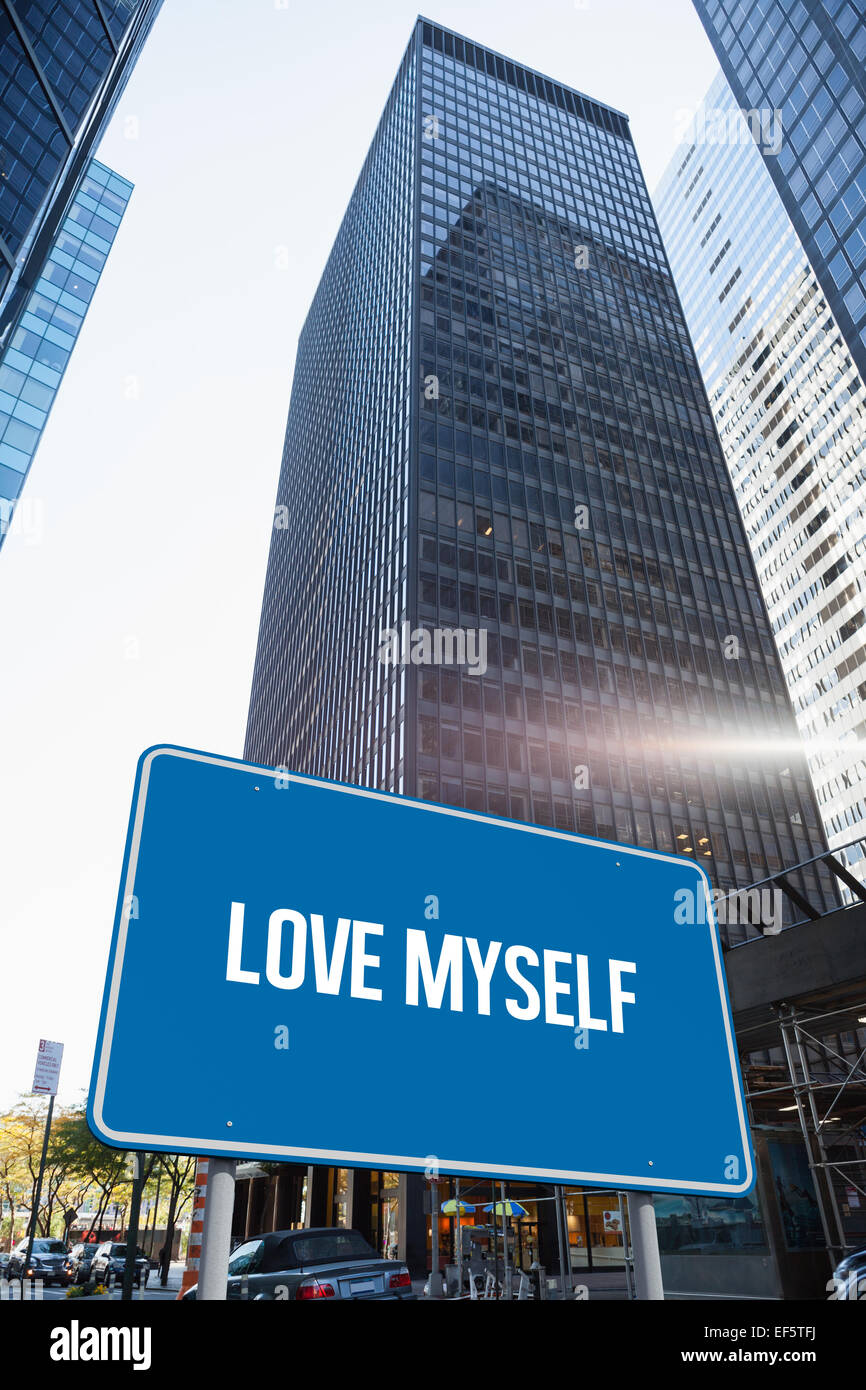 Love myself against skyscraper in city Stock Photo