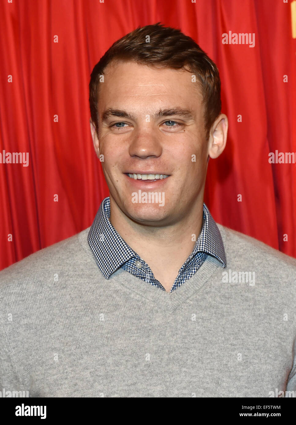 Berlin, Germany. 26th January, 2015. Manuel Neuer, goalkeeper for the national soccer team, poses next to his wax figure (not pictured) at Madame Tussauds in Berlin, Germany, 26 January 2015. It cost 200,000 Euros to make the figure, which can be seen in the sport section of the wax museum starting Tuesday, 27 January 2015. Photo: JENS KALAENE/dpa/ Alamy Live News Stock Photo