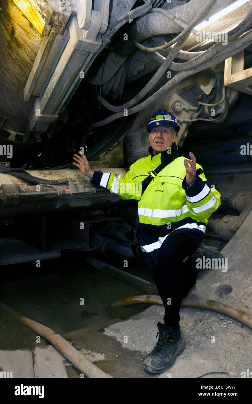 Copenhagen, Denmark, January 27, 2015: Guy Taylor, Project Director at Metroselskabet, explains about the tunnel boring machines (TBM). Here pictured just before the actual drilling head. The TBMs are all custom built for this project Credit:  OJPHOTOS/Alamy Live News Stock Photo