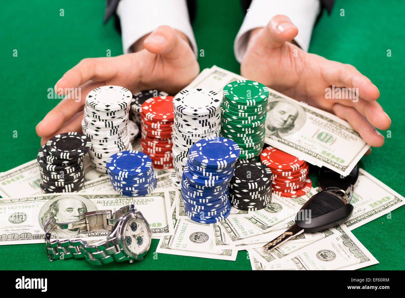 poker player with chips and money at casino table Stock Photo - Alamy