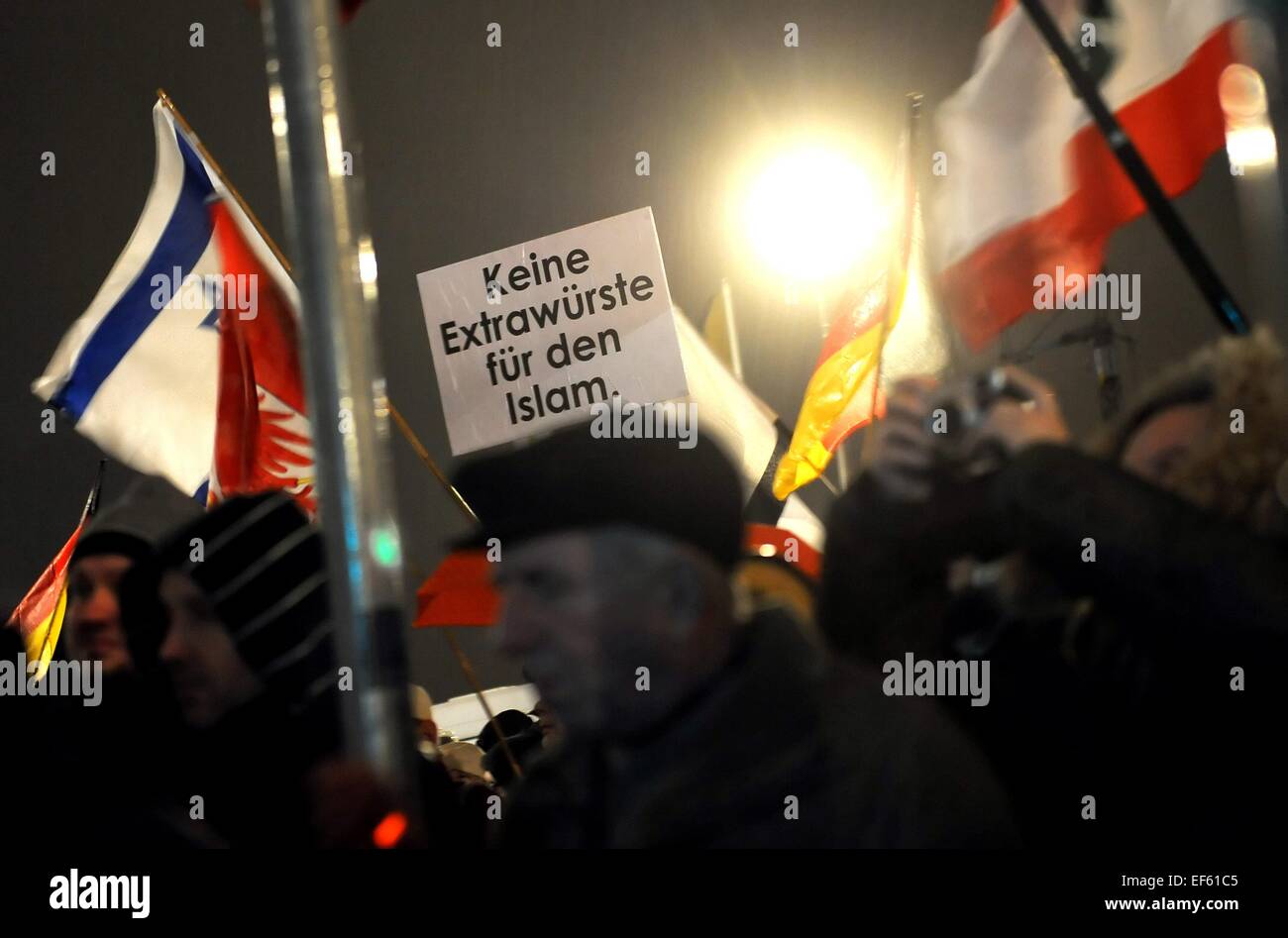 Berlin, Germany. 26th Jan, 2015. Participants is a Baergida (Berlin against the Islamization of the West) carry a poster that reads 'No special treatment for Islam' in front of the main train station in Berlin, Germany, 26 January 2015. Photo: Britta Pedersen/dpa/Alamy Live News Stock Photo
