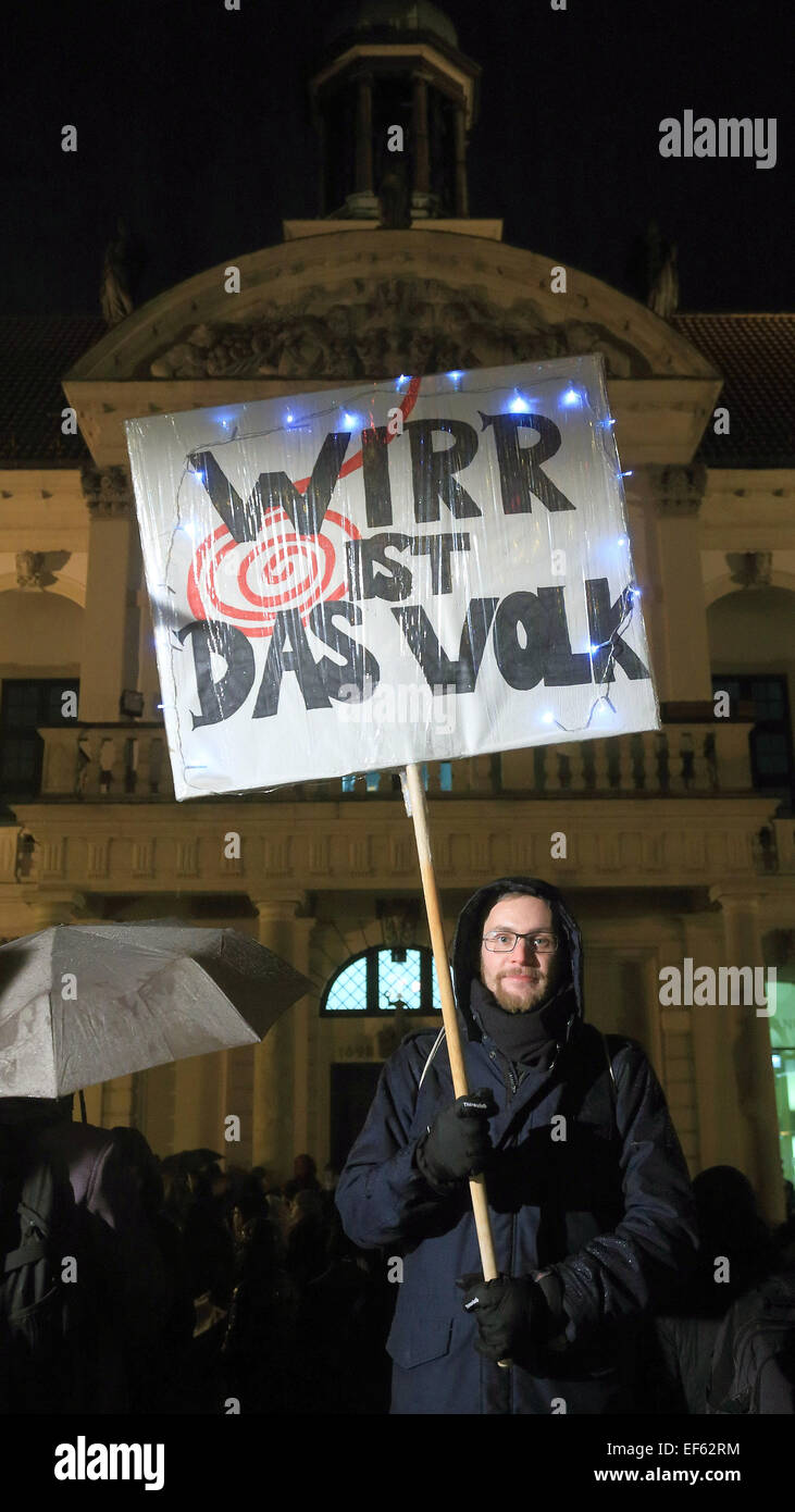 Magdeburg, Germany. 26th Jan, 2015. Participants in a counter-demonstration against the Magida (Magdeburg against the Islamization of the West) protest hold up a sign that reads 'confused are the people' (ed. a play on words with 'we are the people') in Magdeburg, Germany, 26 January 2015. Magida is a regional offshoot of the Pegida (Patriotic Europeans against the Islamization of the West) movement. Photo: JENS WOLF/dpa/Alamy Live News Stock Photo