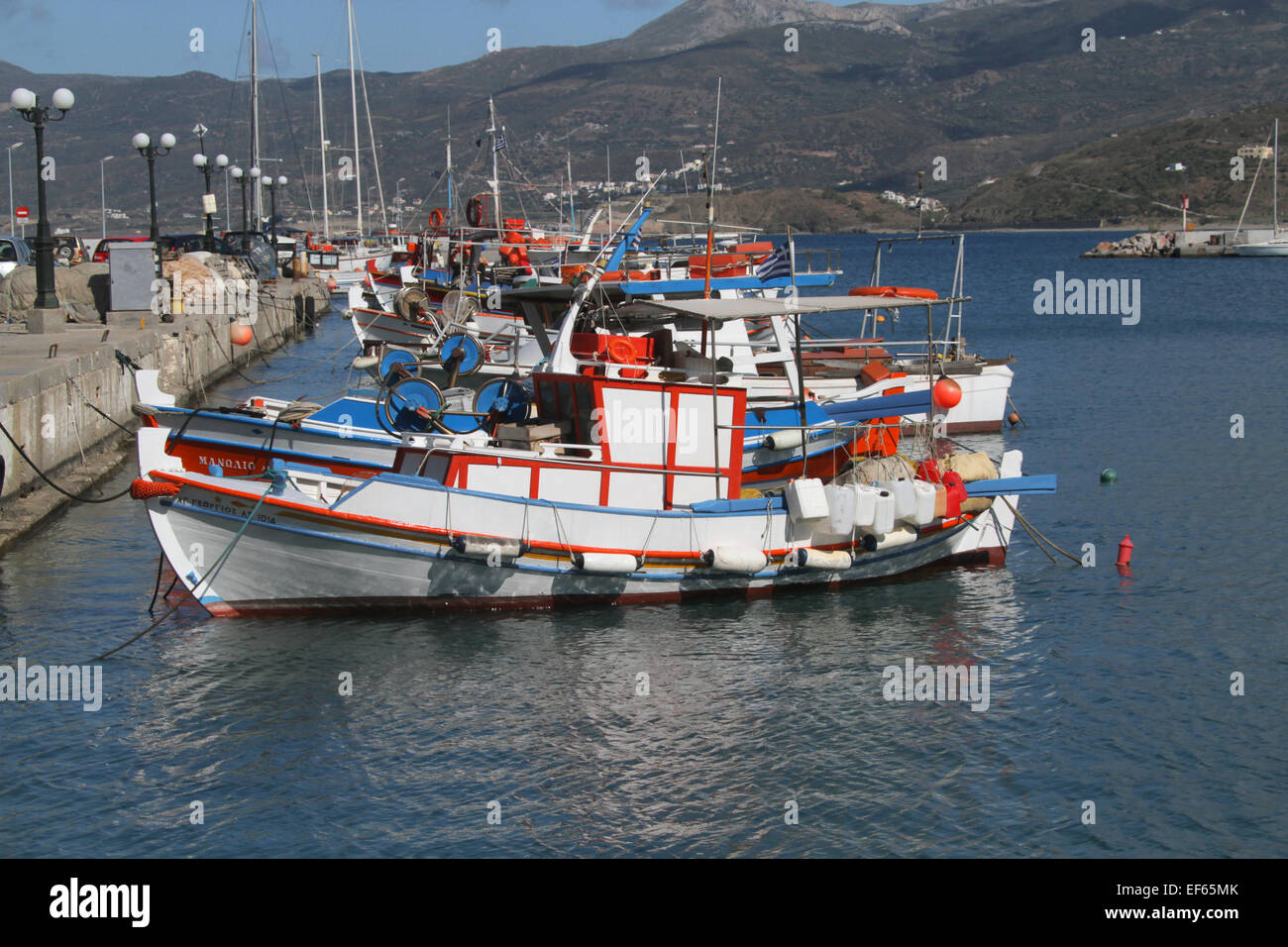 Multi coloured multi colored fishing boats hi-res stock photography and ...