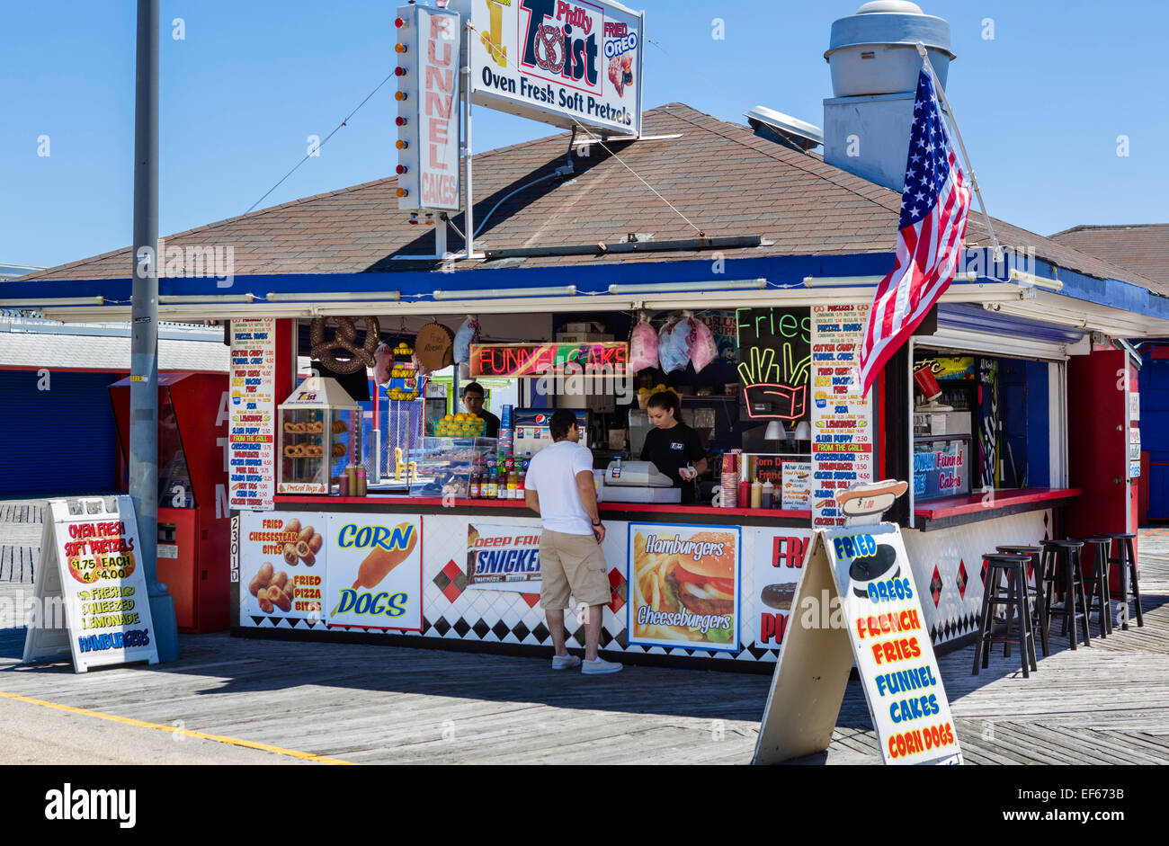 Stand selling funnel cake, pretzels, fries, corn dogs etc. on the boardwalk in North Wildwood, New Jersey, USA Stock Photo