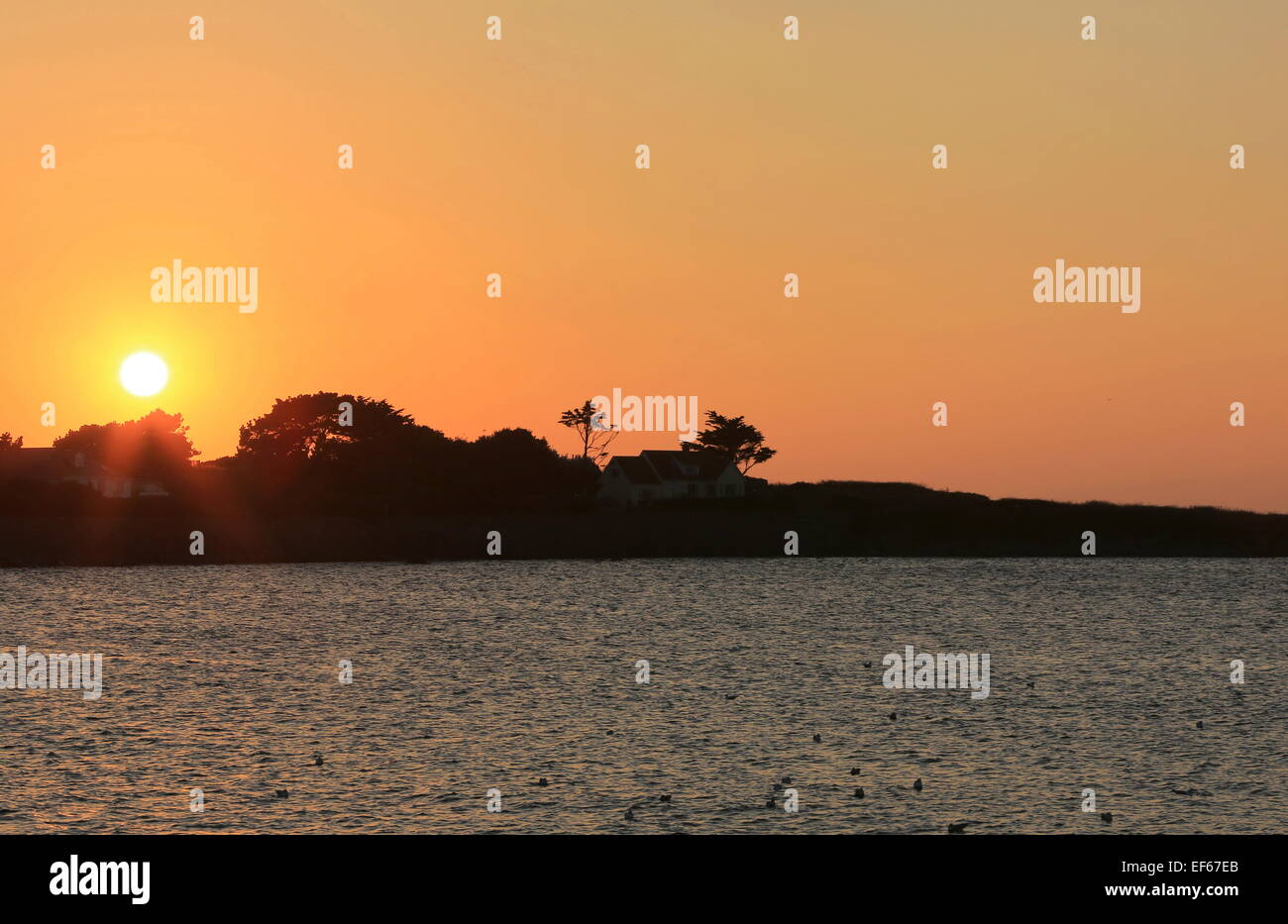 Sunset at Perelle Bay, Guernsey, Channel Islands Stock Photo
