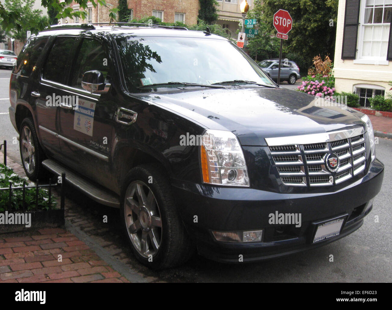 The 2009 Cadillac Escalade Hybrid is a full-size luxury SUV offering both power and fuel efficiency. With advanced hybrid technology and a luxurious interior, it delivers a smooth, powerful ride while offering eco-conscious benefits. Stock Photo