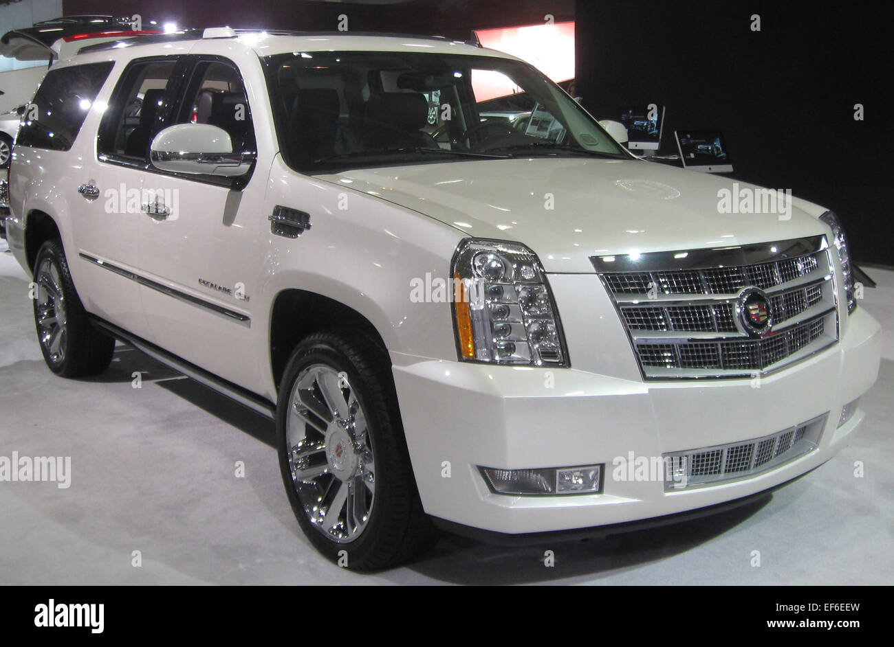 The 2011 Cadillac Escalade ESV Platinum, displayed at the 2011 DC Auto Show, is a luxury full-size SUV. It offers a powerful V8 engine, spacious interior, and premium features for maximum comfort. Stock Photo