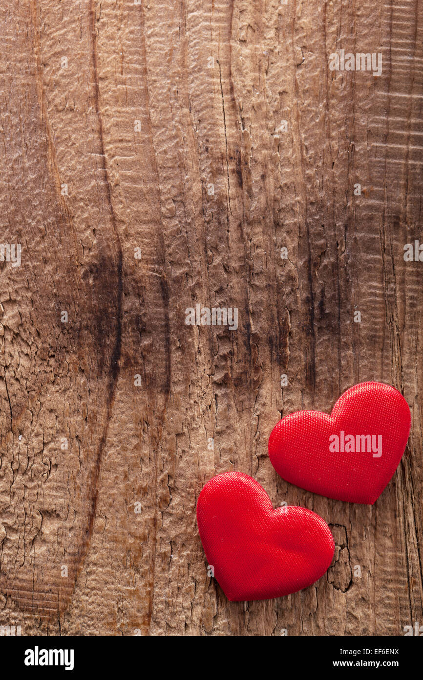 red hearts over wooden background for Valentines day Stock Photo - Alamy