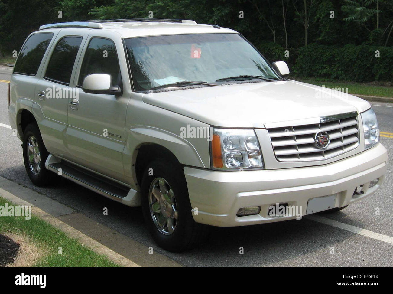 The second-generation Cadillac Escalade is a full-size luxury SUV that offers powerful performance, a refined interior, and advanced technology. Known for its spacious cabin and towing capacity, it is designed for those seeking comfort, luxury, and versatility. Stock Photo