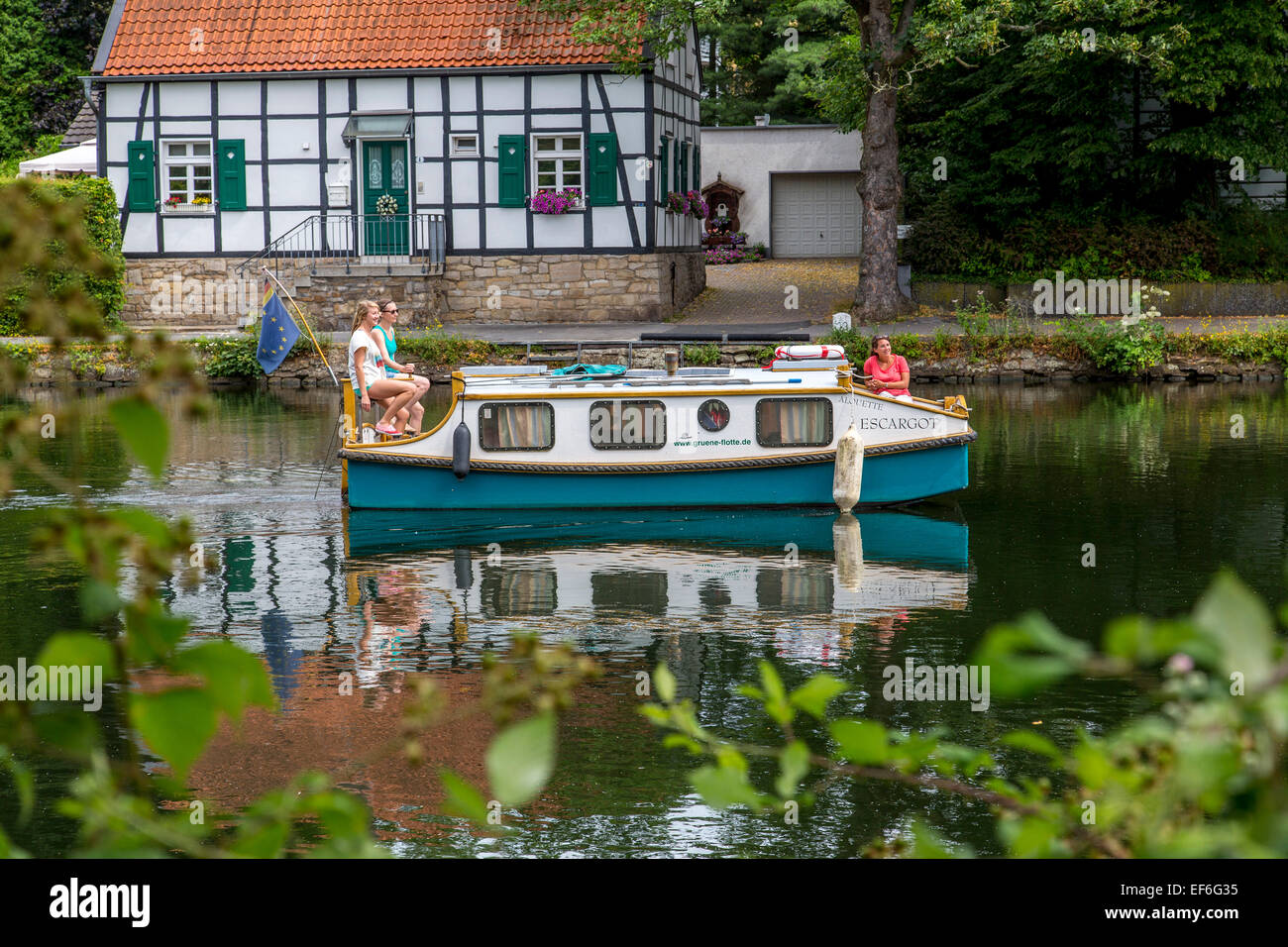 Pedal boat, houseboat 'Escargot', self driven boat with accommodation for 4 people on river Ruhr, Stock Photo