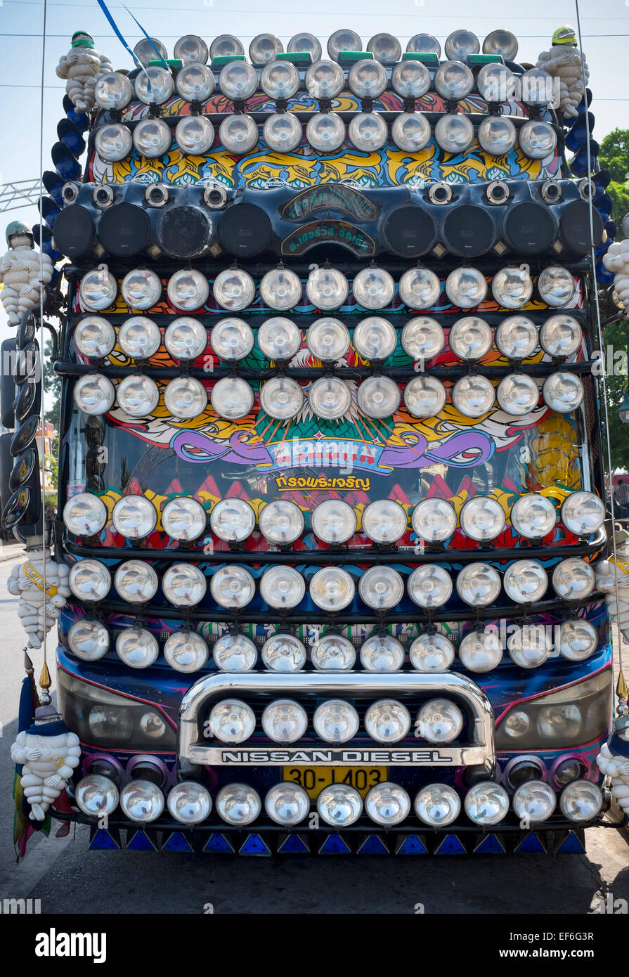Super Coach covered with Headlights in Thailand Stock Photo