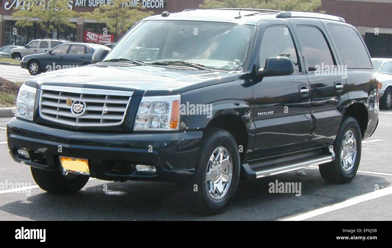 The Cadillac Escalade is a full-size luxury SUV known for its bold design and premium features. Equipped with a 6.2L V8 engine, it delivers powerful performance and a smooth, comfortable ride. The Escalade offers three-row seating and high-end amenities, making it an ideal choice for those seeking a high-performance luxury vehicle with ample space. Stock Photo