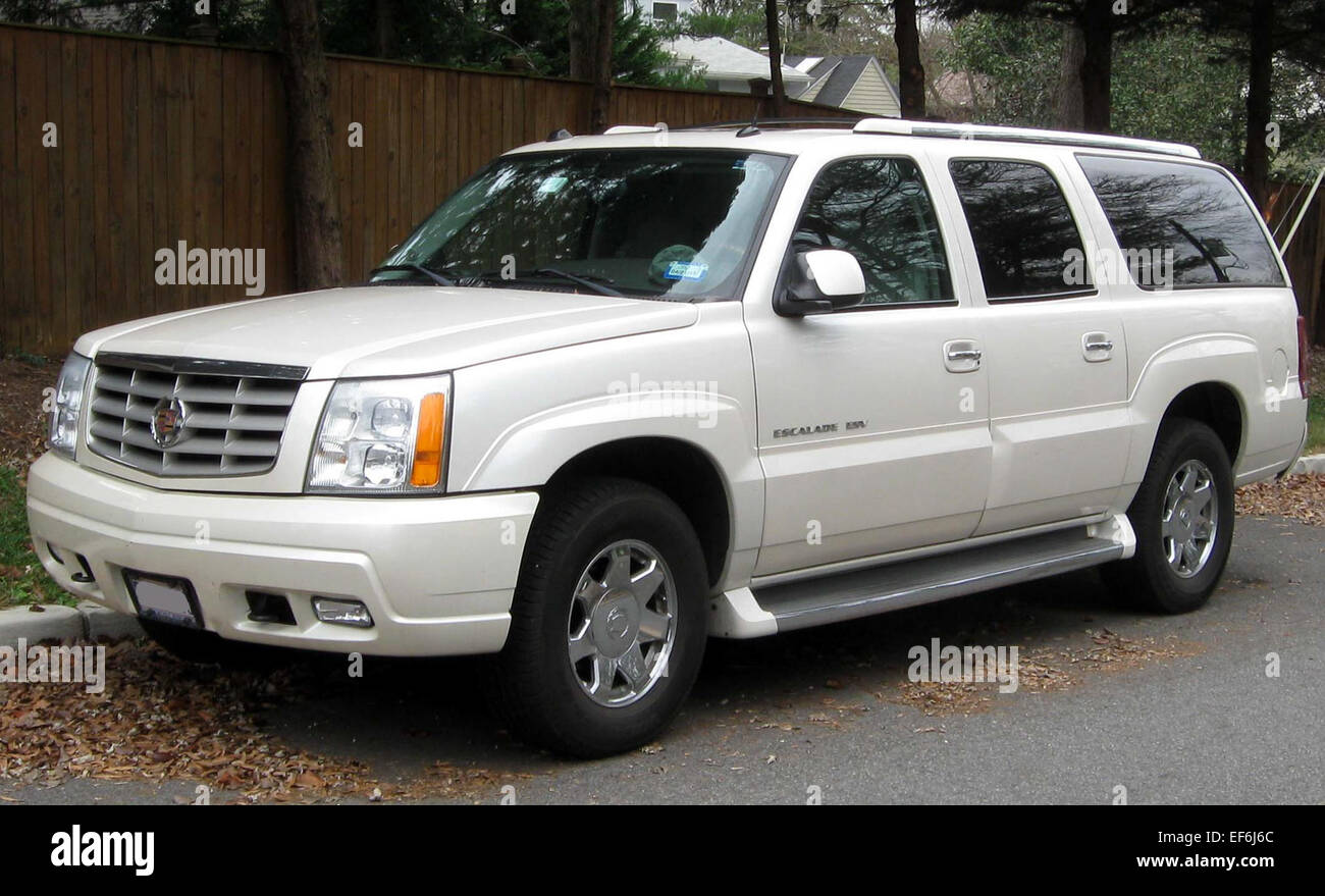 The 2011 Cadillac Escalade ESV is a full-size luxury SUV that provides a refined ride, powerful V8 engine, and spacious interior. Known for its high-end features, it is ideal for families and those seeking both luxury and utility. Stock Photo