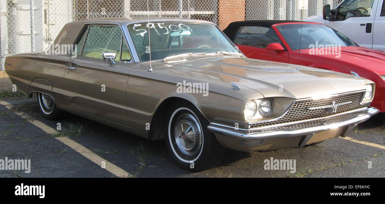 The Ford Thunderbird, known for its classic styling and status as an American icon, was reintroduced as a retro-styled roadster in the early 2000s. This 2010 model offered a V8 engine and premium features for those seeking a blend of performance and luxury. Stock Photo