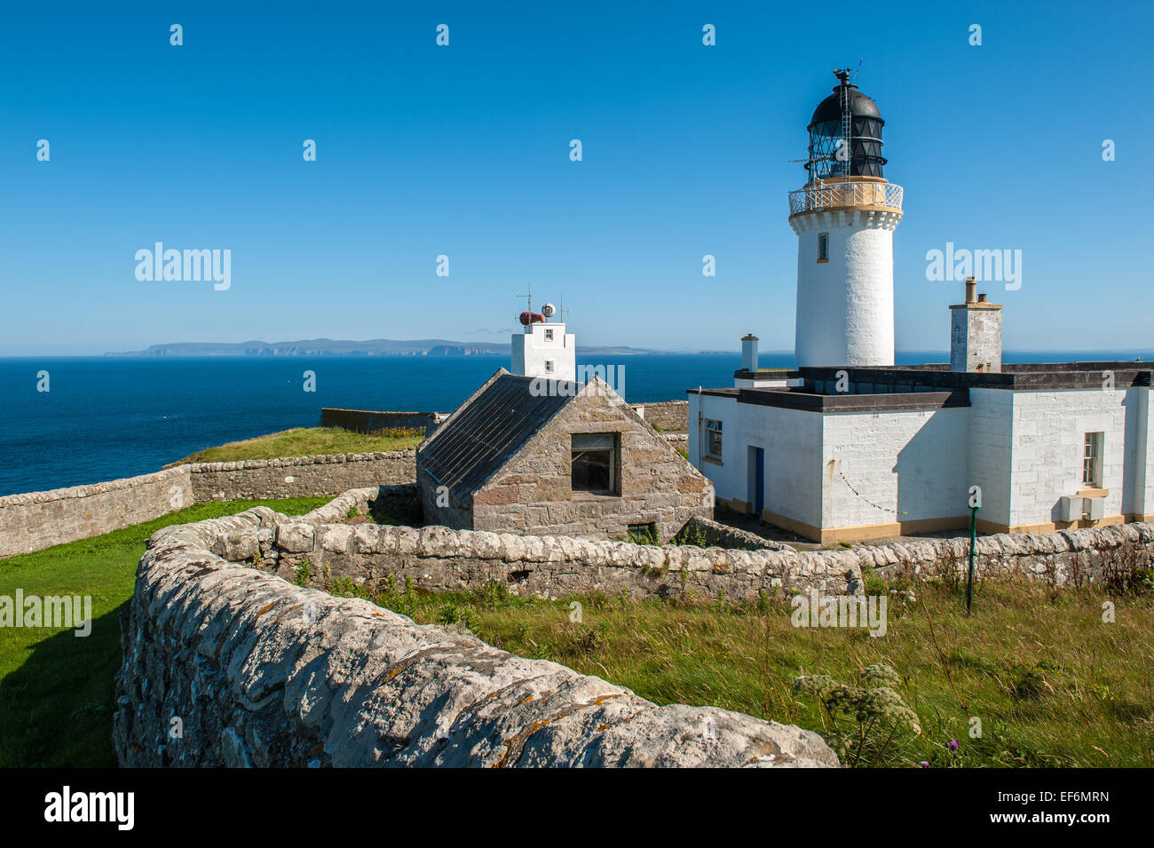Dunnet Head Lighthouse, the most northerly point of the UK mainland at dusk Stock Photo