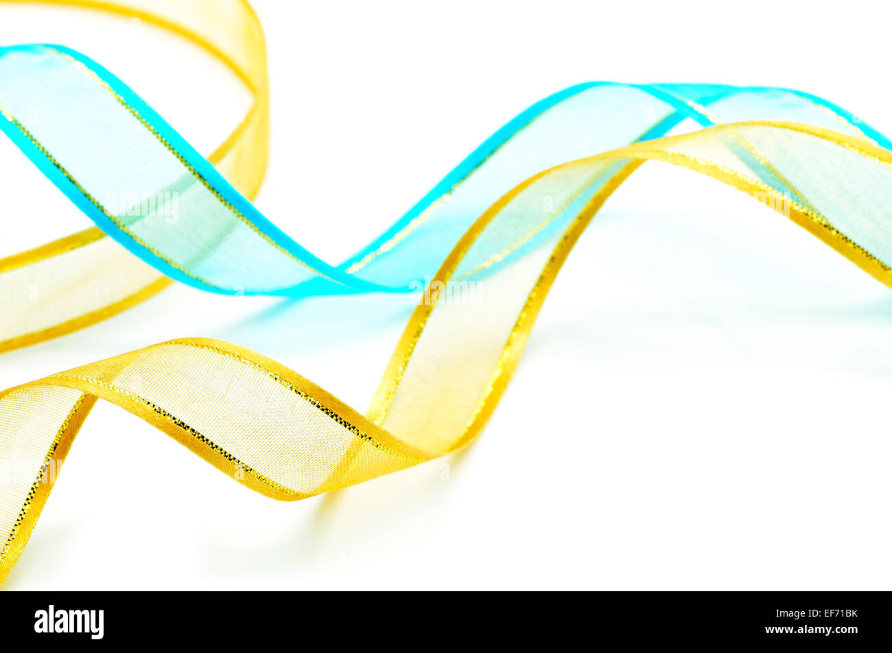 Blue and yellow ribbon, isolated on a white background Stock Photo - Alamy