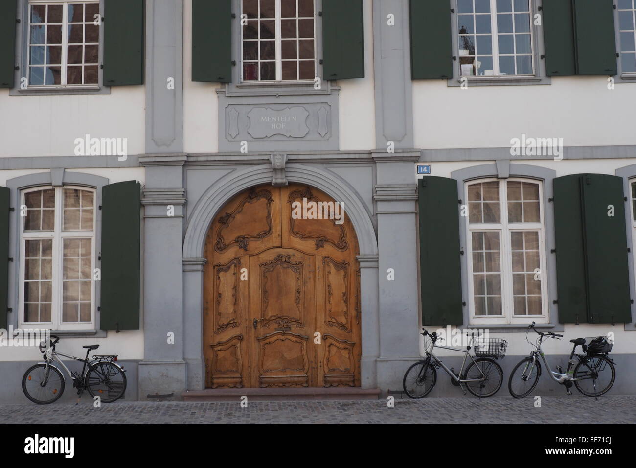 Bicycles parked alongside an ornate building. Stock Photo