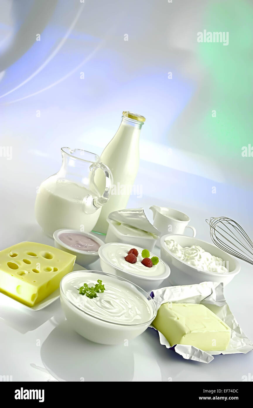 Various dairy products in different containers Stock Photo