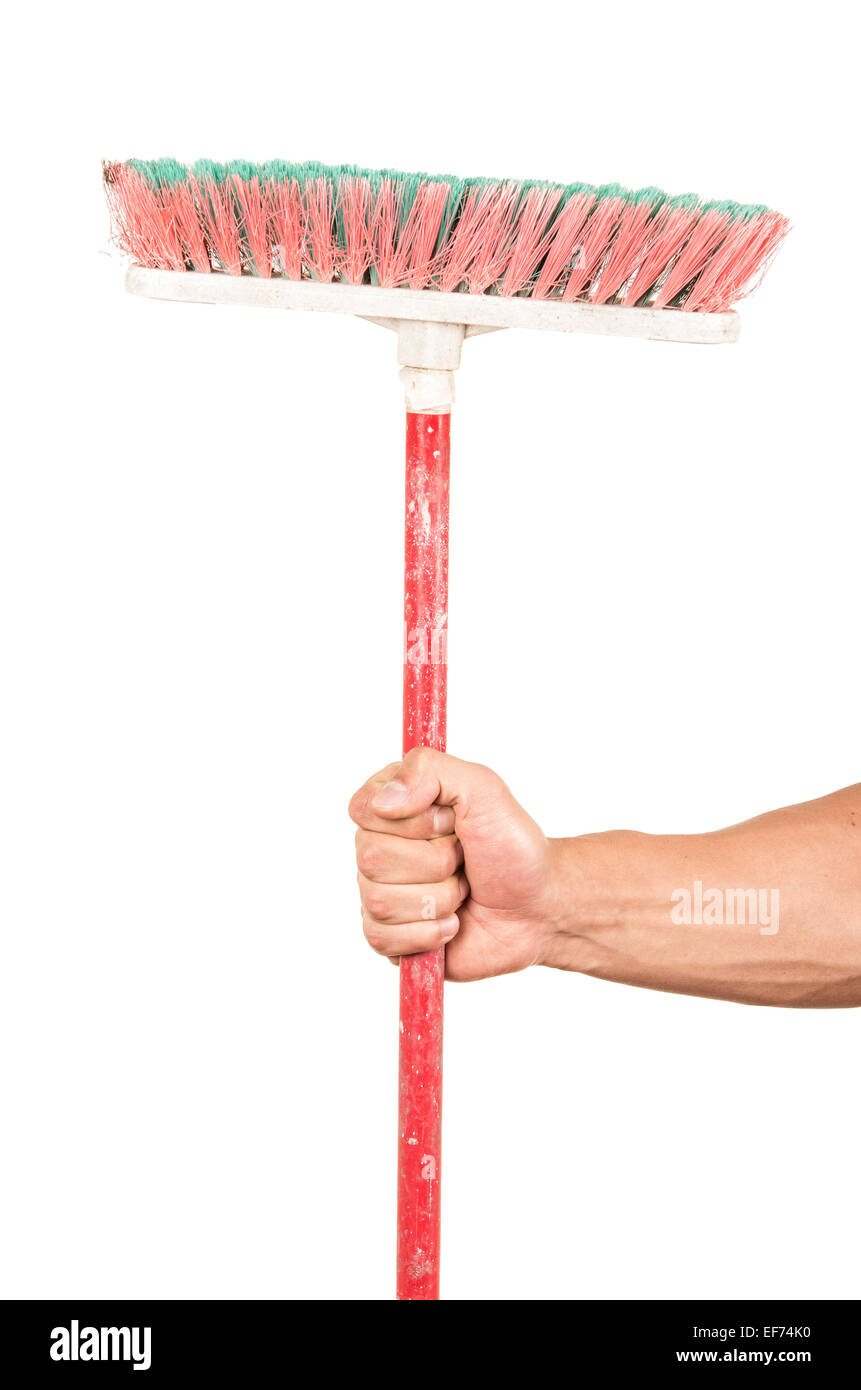 closeup of hand holding a broom Stock Photo Alamy