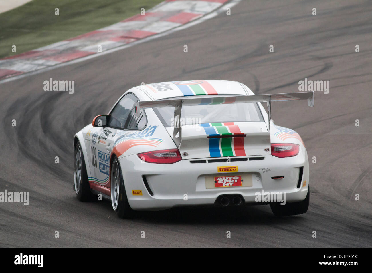 Imola, Italy - October 11, 2014: A Porsche 997 Cup Gtc of Drive Technology Italia team, driven By Bodega Giuseppe and Maestri Stefano, the C.I. Gran Turismo car racing on October 11, 2014 in Imola, Italy. Stock Photo