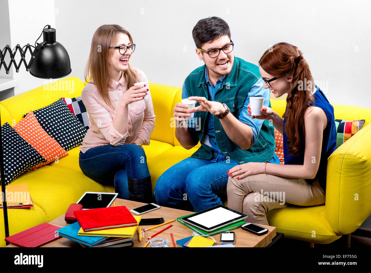 Friends laugh sofa hires stock photography and images Alamy