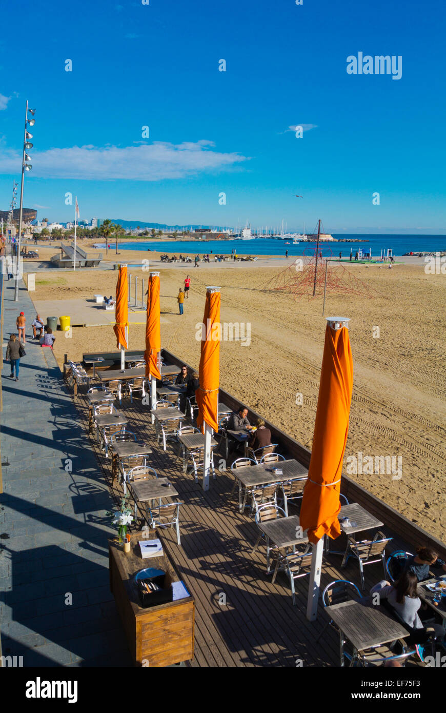 Restaurant terrace on the beach at La Barceloneta, Barcelona, Spain Stock Photo
