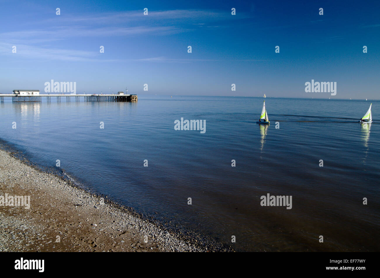 Dinghies from Penarth Yacht Club sailing off Penarth, Vale of Glamorgan, South Wales, UK. Stock Photo