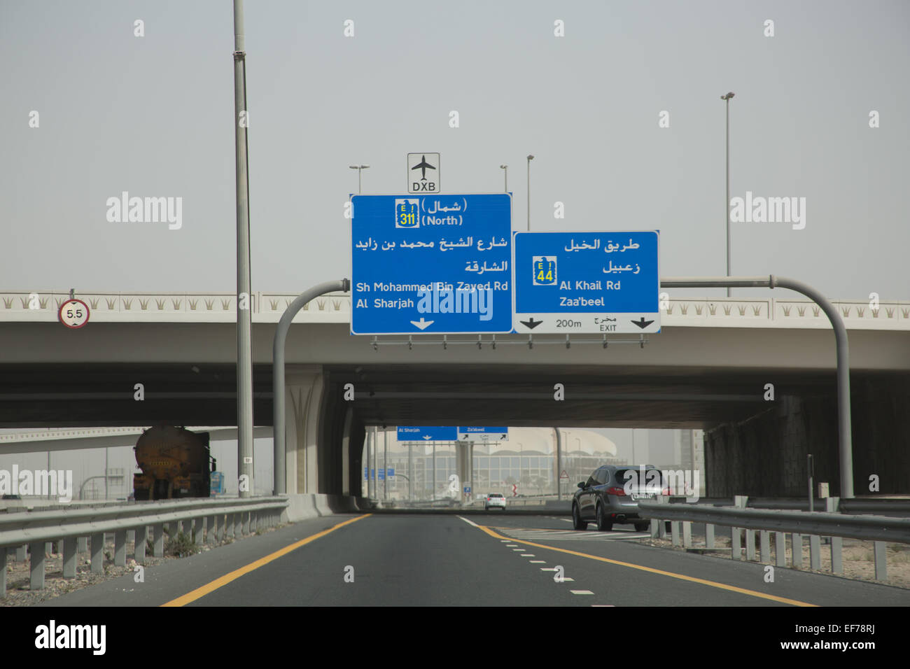 Dubai motorway signs to Sh Mohammed Bin Zayed Rd and Al Sharjah Stock