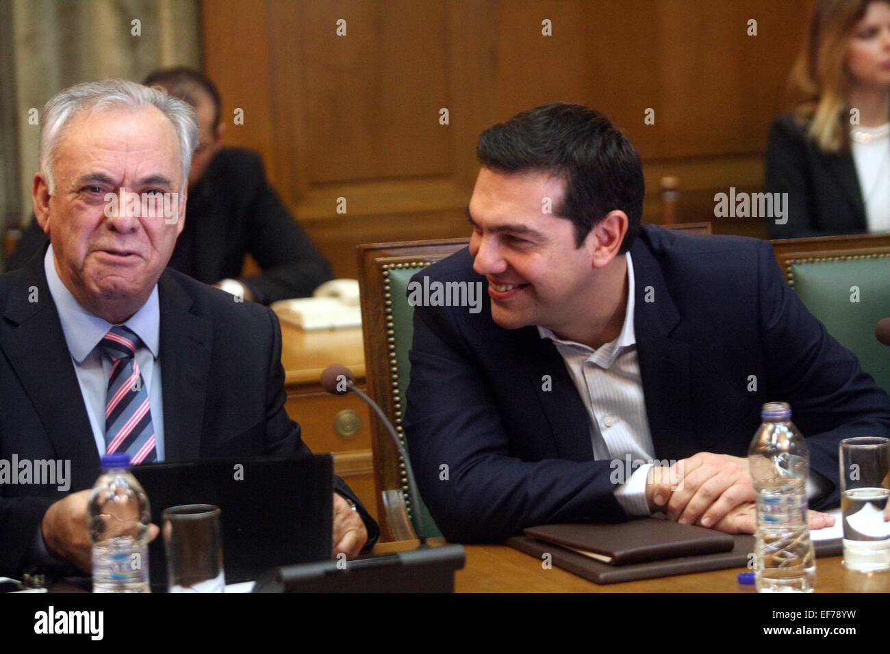 Athens. 28th Jan, 2015. Greece's Prime Minister Alexis Tsipras (R) chairs the first cabinet meeting of his government at the Parliament in Athens, Jan. 28, 2015. Greece's new leftist prime minister says his government's top priorities are to negotiate with Greece's partners to resolve the country's financial predicament and to deal with what he describes as Greece's humanitarian crisis. Credit:  Marios Lolos/Xinhua/Alamy Live News Stock Photo