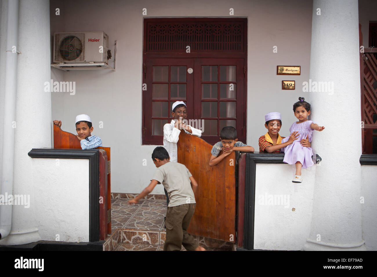 SRI LANKAN CHILDREN AT THEIR HOME IN GALLE OLD TOWN Stock Photo