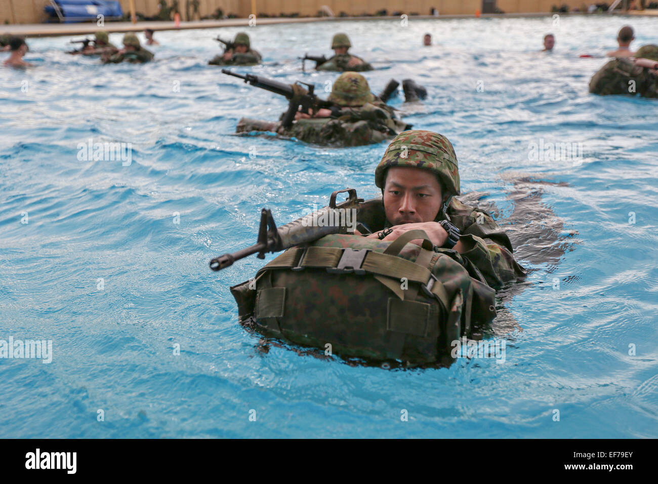Japanese soldiers with the Japan Ground Self-Defense Force complete Marine Corps swim qualification as part of Exercise Iron Fist January 26, 2015 in Camp Pendleton, California. Stock Photo