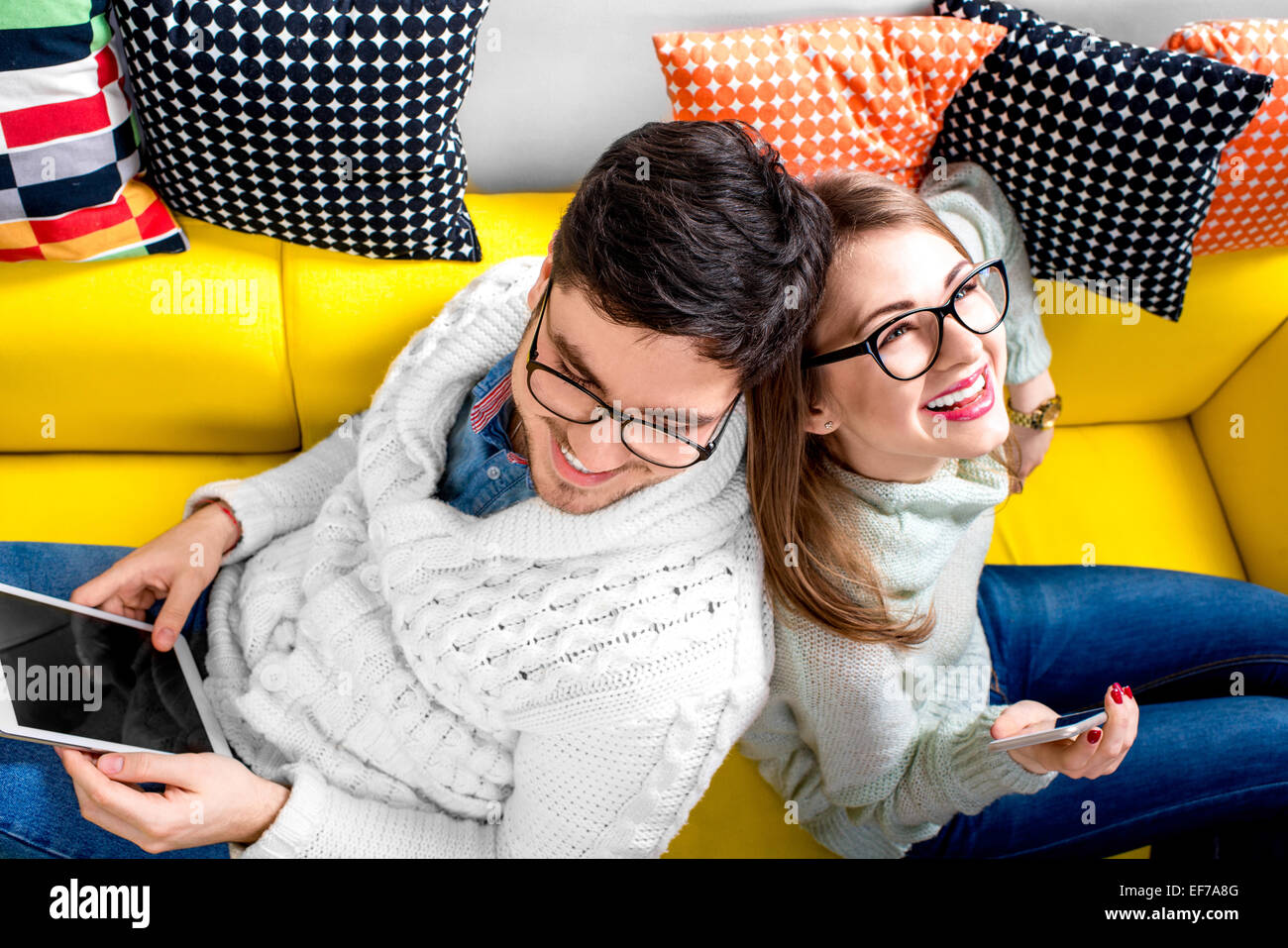 Couple on the couch at home Stock Photo