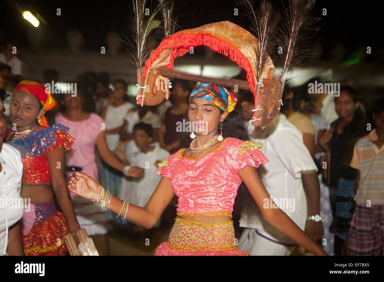 GIRL PERFORMING THE KAVADI PEACOCK DANCE AT SHRINE IN KATARAGAMA Stock Photo