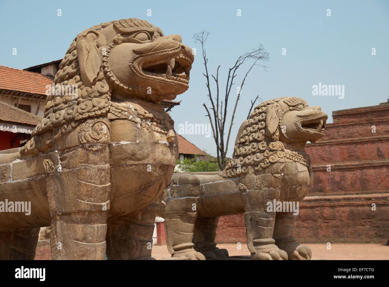 Old buddhistic statues on Bhaktapur Square. Kathmandu, Nepal Stock Photo