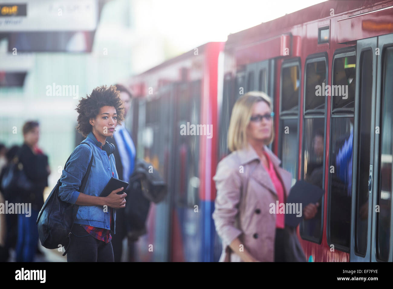 People boarding train Stock Photo