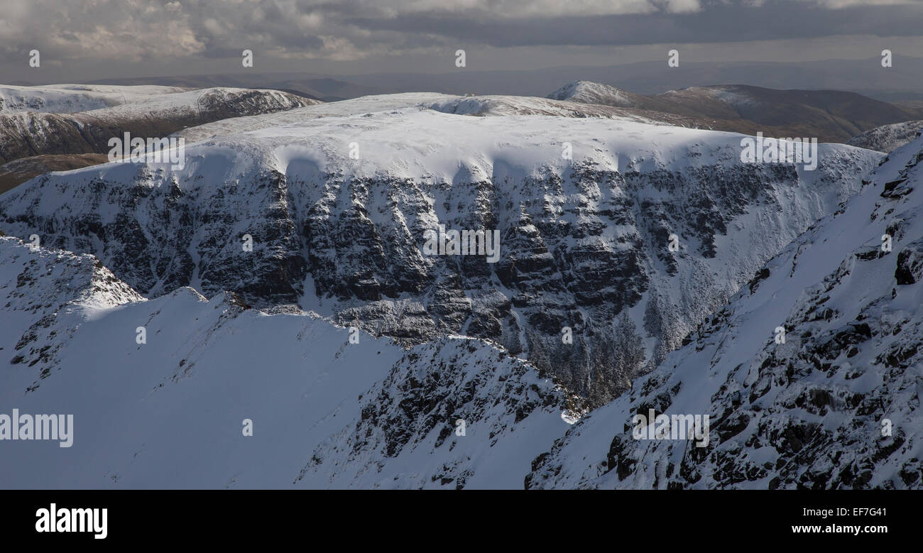 St Sunday Crag and Striding Edge from near the summit of Helvellyn on a sunny winters day in the Lake District, Cumbria, UK Stock Photo