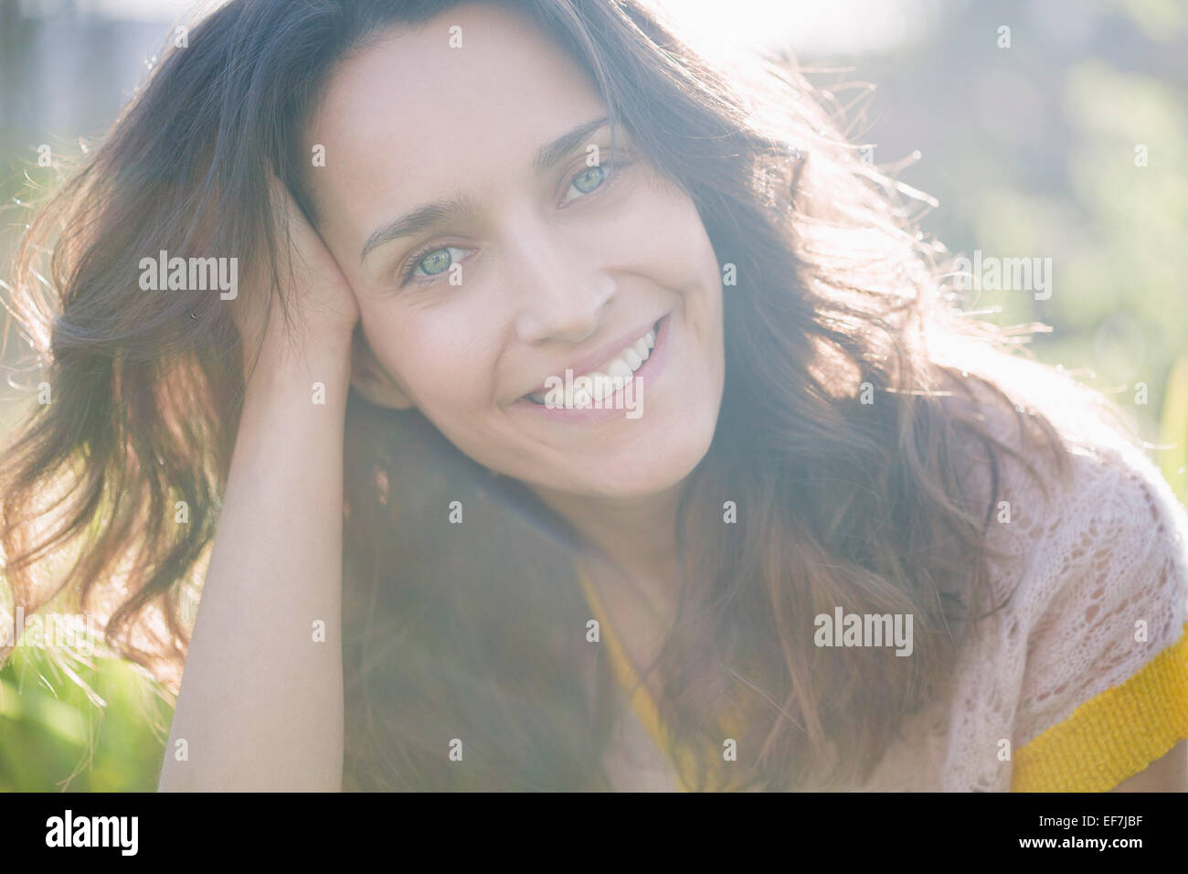 Portrait of a beautiful woman smiling Stock Photo - Alamy
