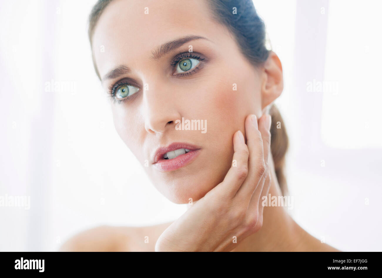Woman looking up hi-res stock photography and images - Alamy