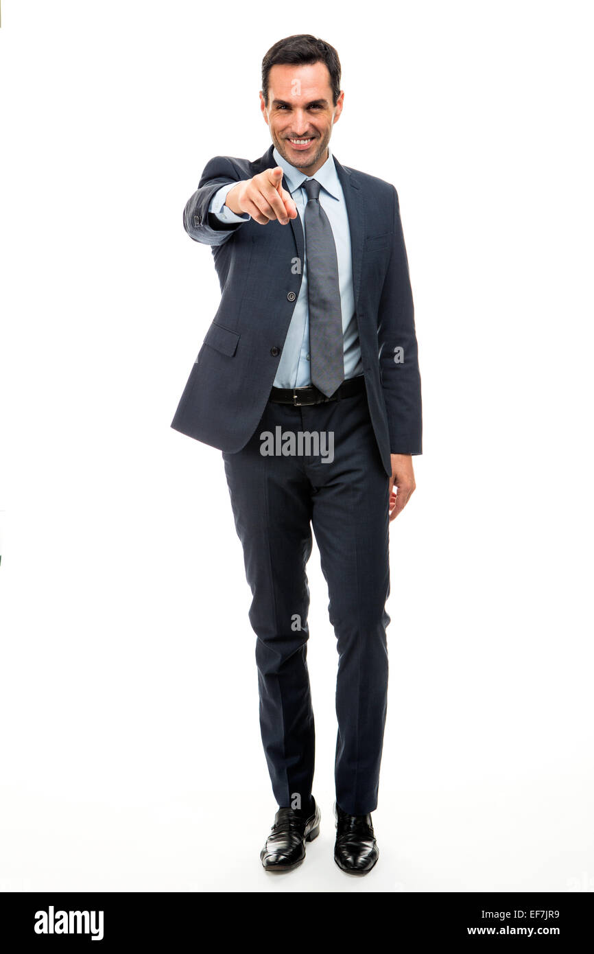 Full length portrait of a businessman smiling and pointing finger while walking Stock Photo