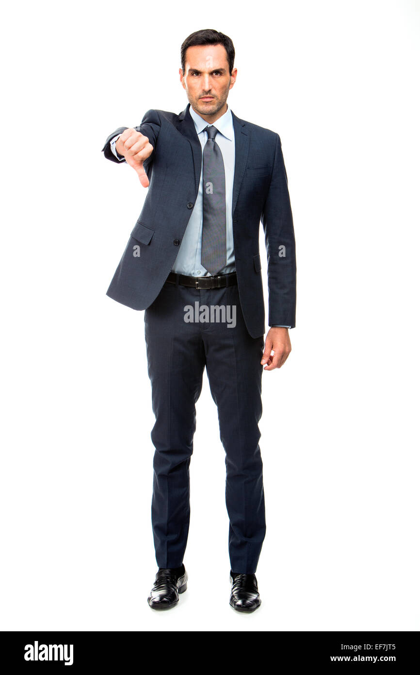 Full length portrait of a businessman looking angry, thumb down with one hand Stock Photo