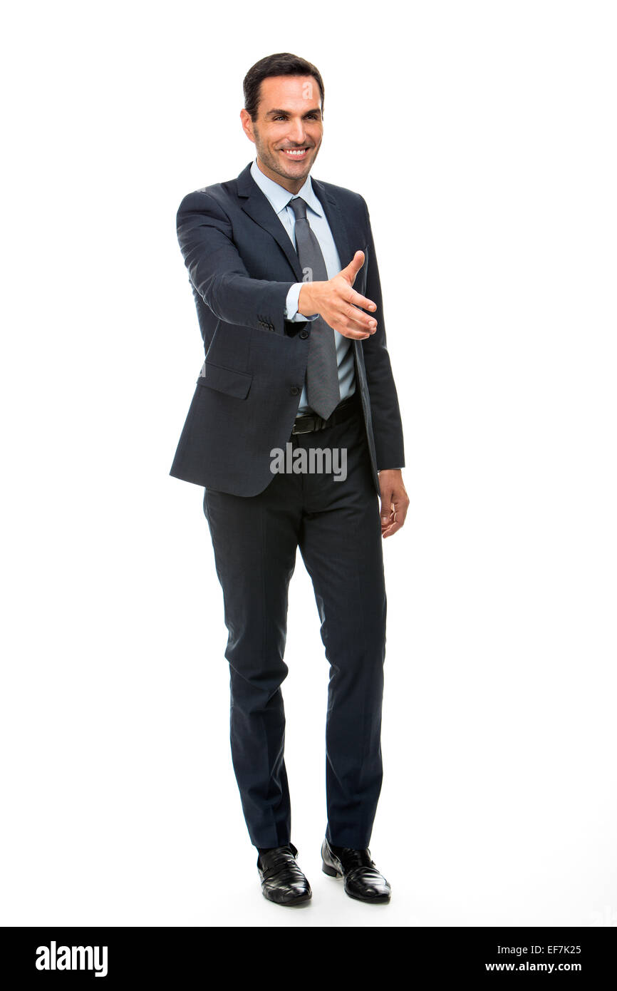 Full length portrait of a businessman smiling raising his arm for shaking hands Stock Photo
