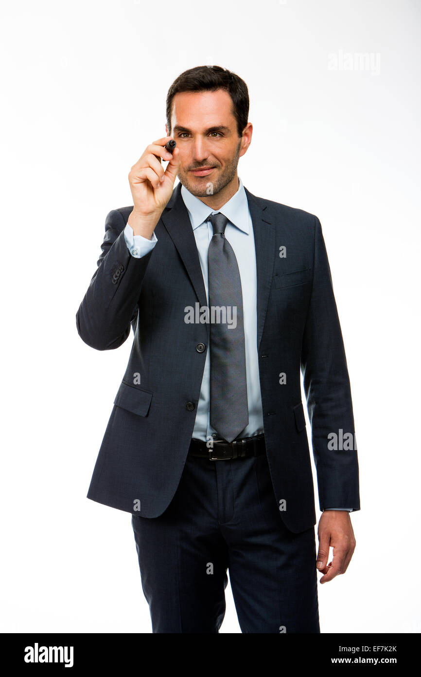Half length portrait of a businessman with a black marker writing on the screen Stock Photo